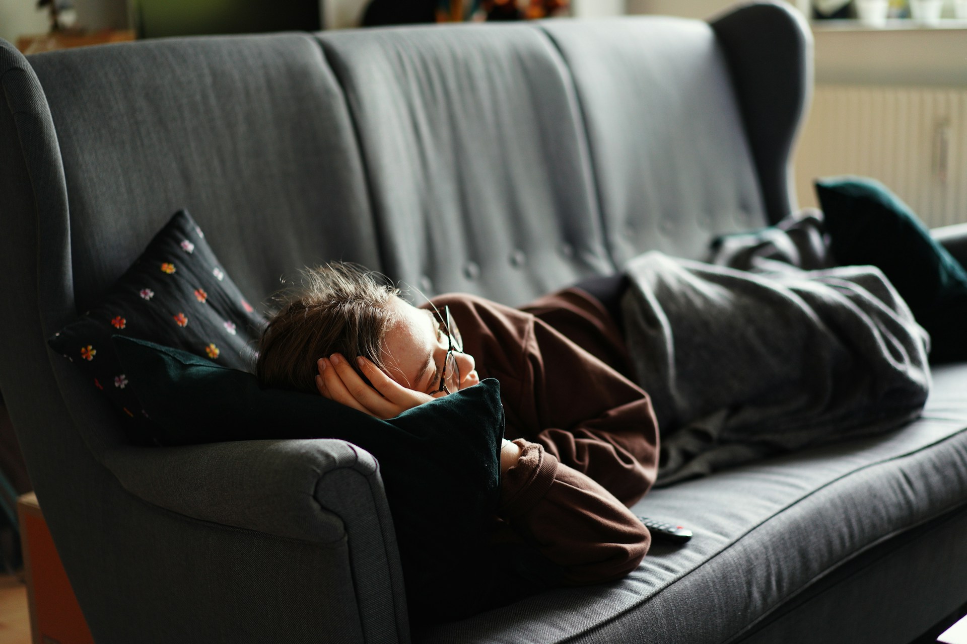 Man laying on couch.